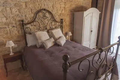 Letto o letti in una camera di Borgo di Vezzano