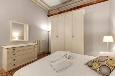 Letto o letti in una camera di Academy House by Mamo Florence