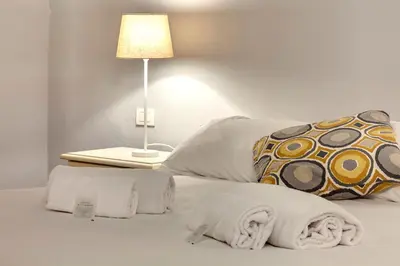 Letto o letti in una camera di Academy House by Mamo Florence