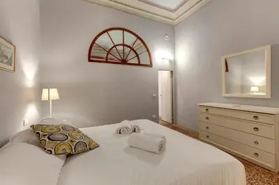 Letto o letti in una camera di Academy House by Mamo Florence