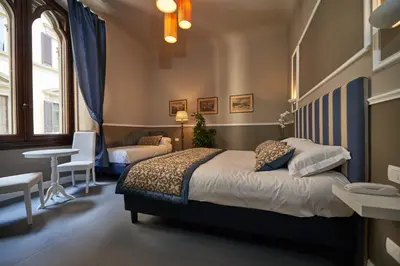 Letto o letti in una camera di My Guest in Florence