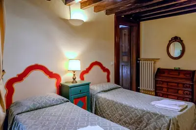 Letto o letti in una camera di Corno Florentine Apartment