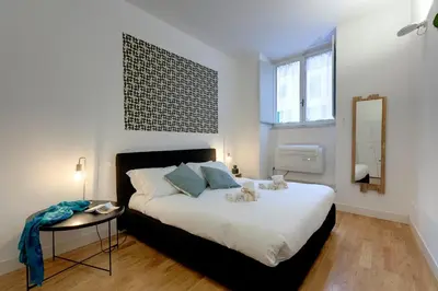 Letto o letti in una camera di Costa San Giorgio Apartment by Mamo Florence