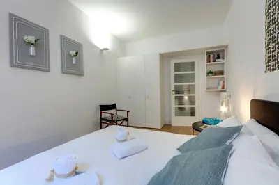 Letto o letti in una camera di Costa San Giorgio Apartment by Mamo Florence