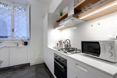 Cucina o angolo cottura di Costa San Giorgio Apartment by Mamo Florence