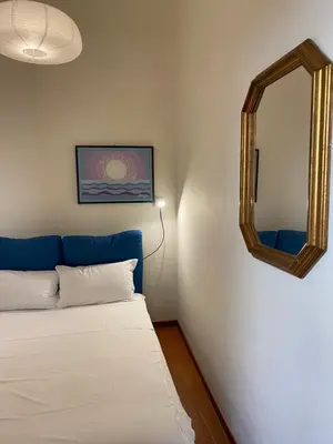 Letto o letti in una camera di Al Campanile