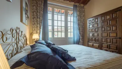 Letto o letti in una camera di Al Campanile