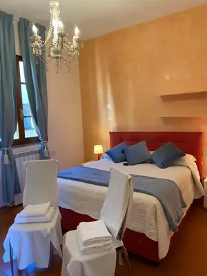 Letto o letti in una camera di Al Campanile