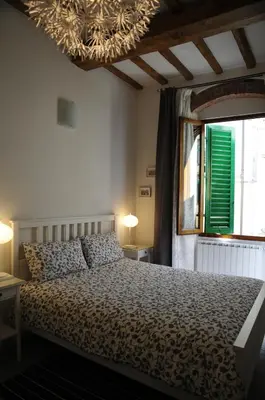 Letto o letti in una camera di Conte Canacci
