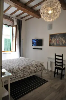 Letto o letti in una camera di Conte Canacci