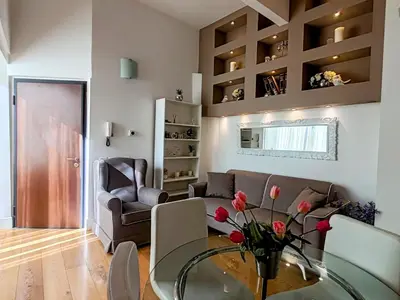 Area soggiorno di Borgo San Jacopo Superior by 360Rentals