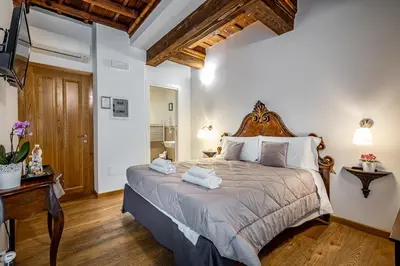 Letto o letti in una camera di La Stella d'Oro B&B
