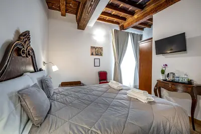 Letto o letti in una camera di La Stella d'Oro B&B