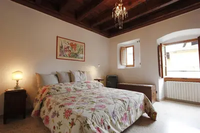 Letto o letti in una camera di Brunelleschi Suite