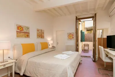 Letto o letti in una camera di Pinocchio House