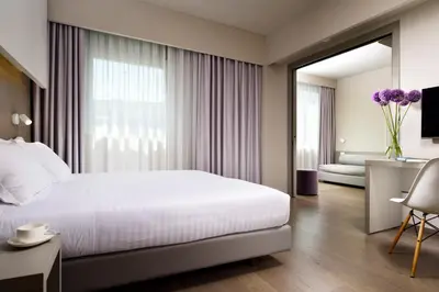 Letto o letti in una camera di Hotel Glance In Florence