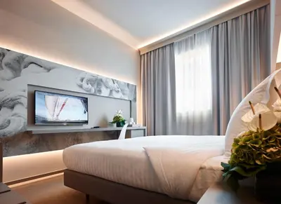 Letto o letti in una camera di Hotel Glance In Florence