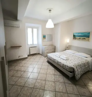 Letto o letti in una camera di Casa Naldi