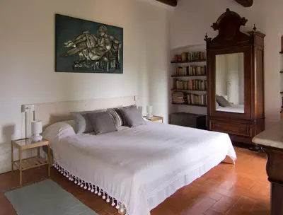 Letto o letti in una camera di Il Monasteraccio