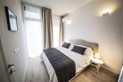 Letto o letti in una camera di TwoBros Apartment