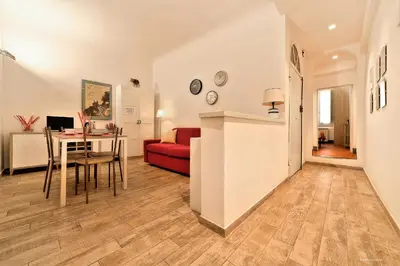Area soggiorno di Wine Apartments Florence Colorino