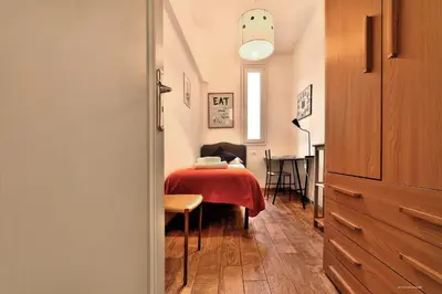 Letto o letti in una camera di Wine Apartments Florence Colorino