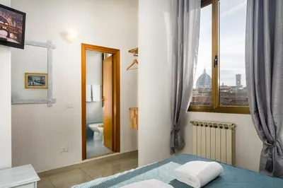 Letto o letti in una camera di Adre Majestic View ! Center of Florence !