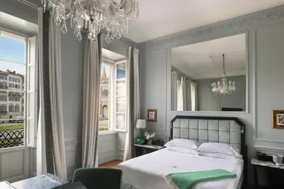 Letto o letti in una camera di The Place Firenze