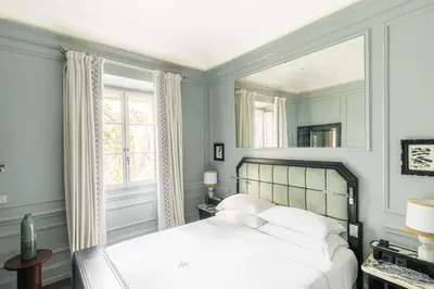 Letto o letti in una camera di The Place Firenze