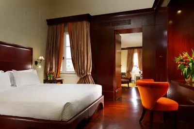 Letto o letti in una camera di Hotel L'Orologio Firenze - WTB Hotels