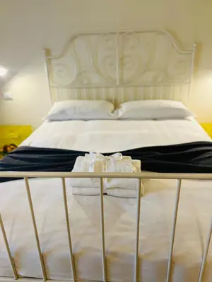 Letto o letti in una camera di Bed & Bed Peterson