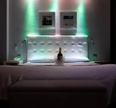 Letto o letti in una camera di Hotel Orcagna