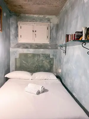 Letto o letti in una camera di Heart of Florence Serragli Apt 10' from Ponte Vecchio