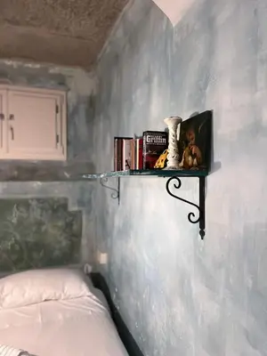Letto o letti in una camera di Heart of Florence Serragli Apt 10' from Ponte Vecchio