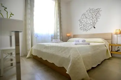 Letto o letti in una camera di Ognissanti 67