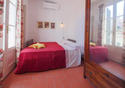 Letto o letti in una camera di Apartments Florence - Carlotta's Home