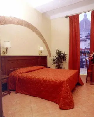 Letto o letti in una camera di Hotel California