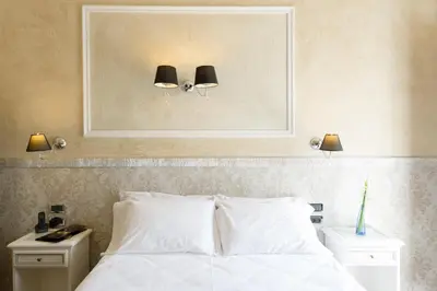Letto o letti in una camera di Hotel California