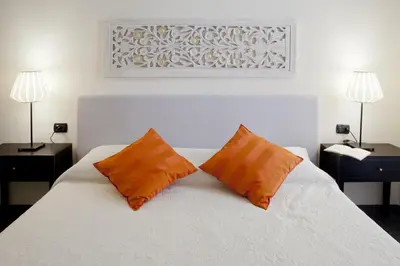 Letto o letti in una camera di Canto dei Mille