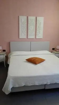 Letto o letti in una camera di Canto dei Mille