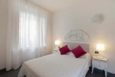 Letto o letti in una camera di Canto dei Mille