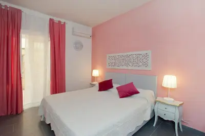 Letto o letti in una camera di Canto dei Mille