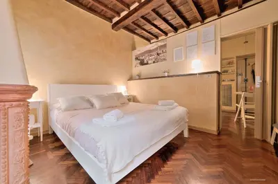Letto o letti in una camera di Wine Apartments Florence Trebbiano