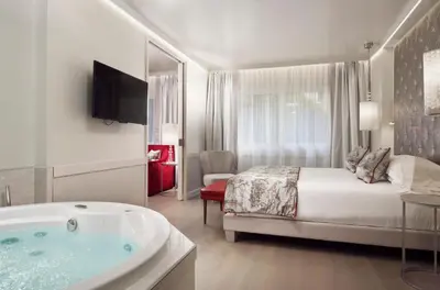 Letto o letti in una camera di Ponte Vecchio Suites & Spa