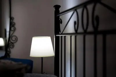 Letto o letti in una camera di La Corte Apartment