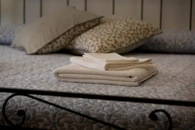 Letto o letti in una camera di La Corte Apartment