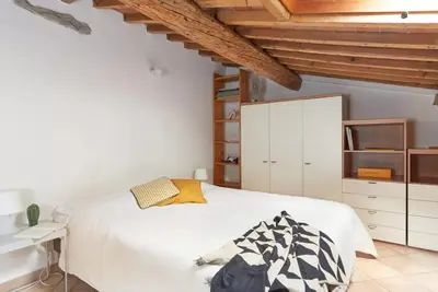 Letto o letti in una camera di Casa Cosi Masaccio