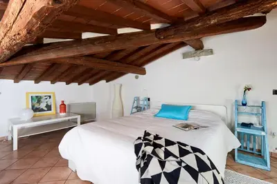 Letto o letti in una camera di Casa Cosi Masaccio