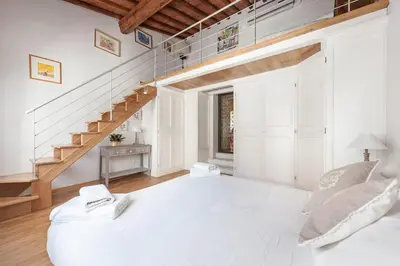Letto o letti in una camera di Una Finestra su Firenze