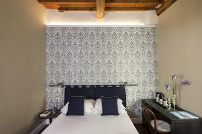 Letto o letti in una camera di Parione Uno